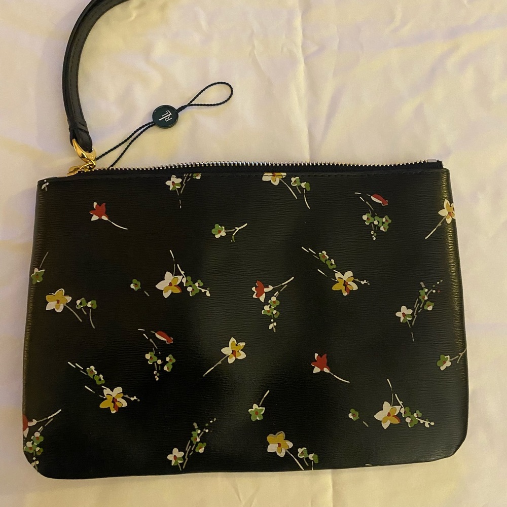 Beautiful clutch by Ralph Lauren. Brand new. Perfect condition.